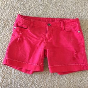 Distressed red shorts