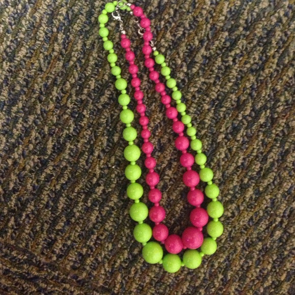 Pink and green beaded necklaces.