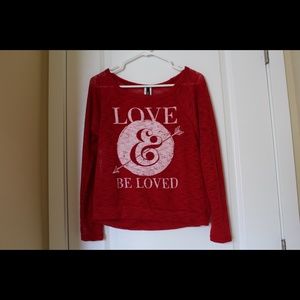 "Love Be Loved" red sweater