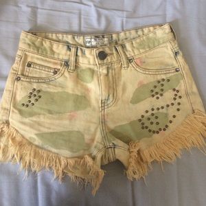 Free people camo distressed studded midrise shorts