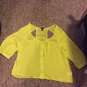 Bright yellow polyester top