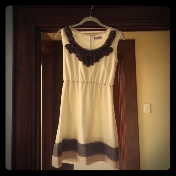 Cream Dress with ruffle detail