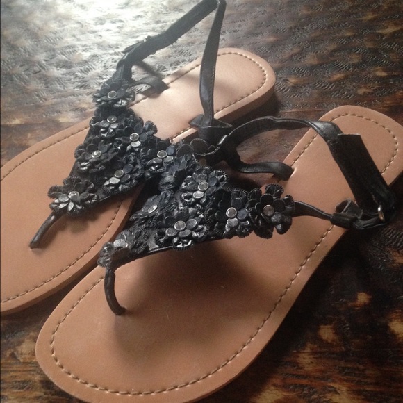 Worn once black flower sandals size 8