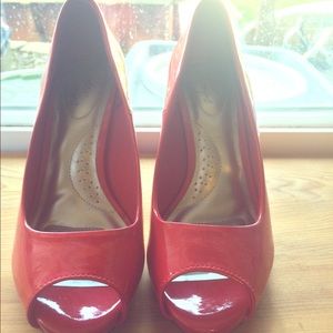 Shiny red peep-toe heels!