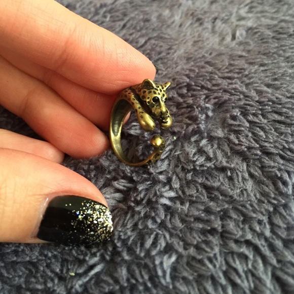 Adorable kitty holding finger ring