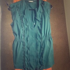Green ruffled shirt