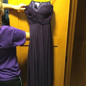 Floor length strapless plum colored prom dress