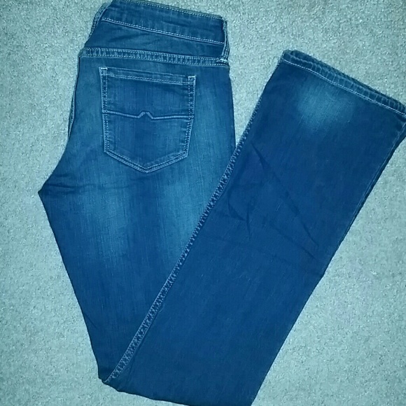 Dark wash bootcut jeans. - Picture 1 of 4