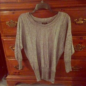 I"am selling a grey long sleeve shirt.