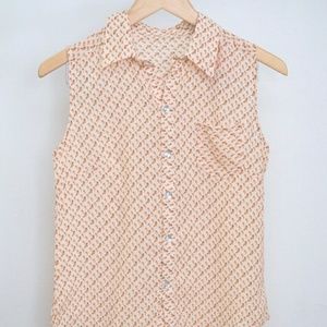 Dog pattern sleeveless blouse