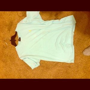 Teal shirt with yellow polo sign(: great condition