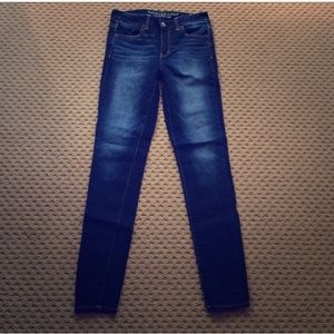 2 pairs of AE jeans size 4 long.