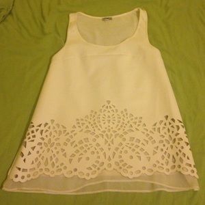 White pleather laser cut shirt from express