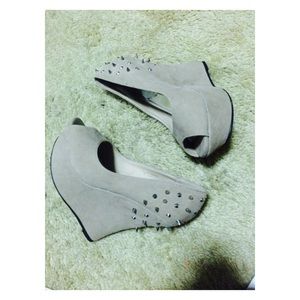 Light brown colored spiked heels