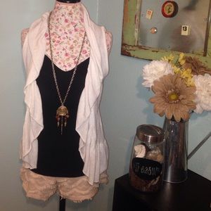 White ruffled fly away sweater jacket