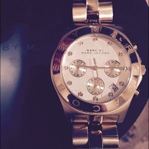 Marc Jacobs gold watch.