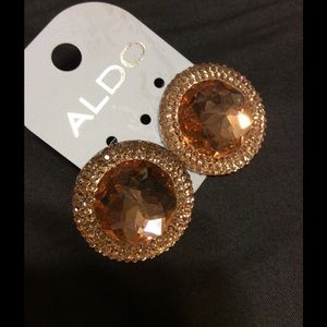 Also earrings