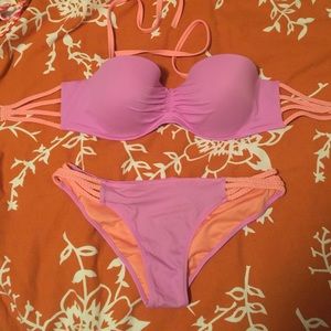 Purple and Orange Victorias Secret swim suit.