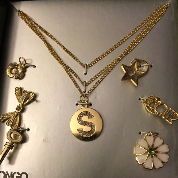Necklace nd 7 charms including the letter S