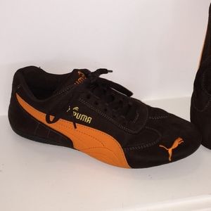 Brown and orange Pumas like new Cute!  7.5