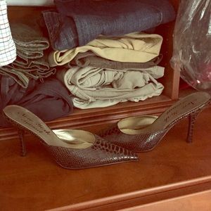 Open back brown snakeskin shoes