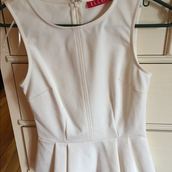 White sleeveless peplum top NWOT