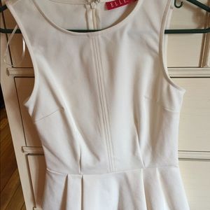 White sleeveless peplum top NWOT