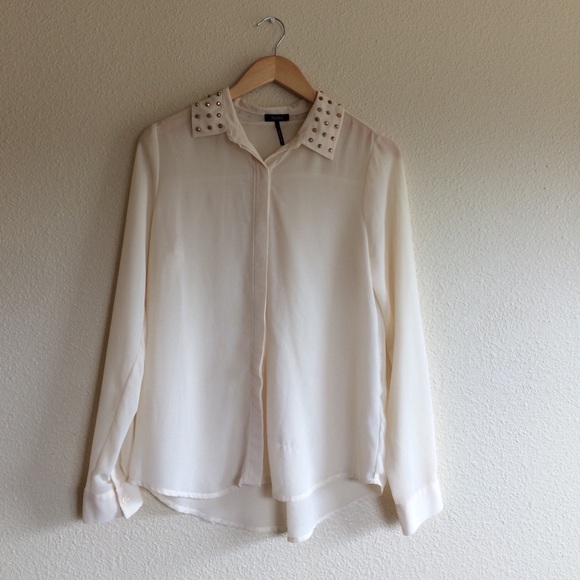 Sheer cream colored top