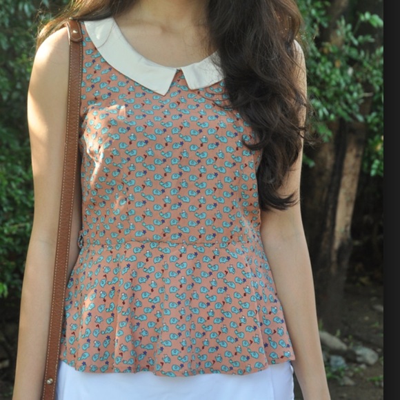 Monteau Elephant Peplum Sleeveless Top