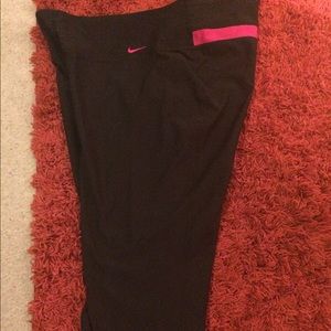 Nike black with pink line in back yoga capris