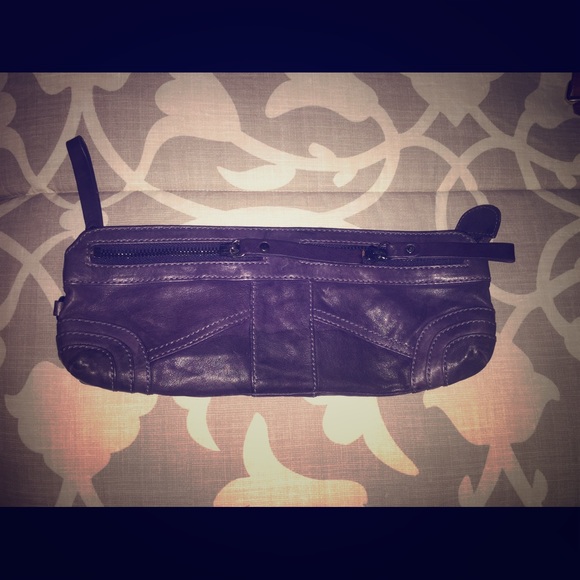 Andrew Marc clutch / handbag. Leather. Grape color