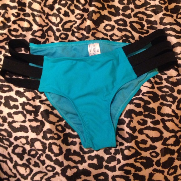 Blue/teal swim suit bottoms with black straps