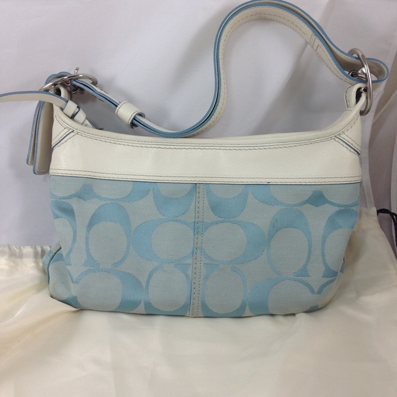 Reduced from $90  Blue coach purse w/white leather