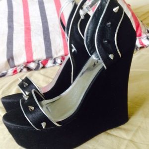 "6" inch heels with spikes.
