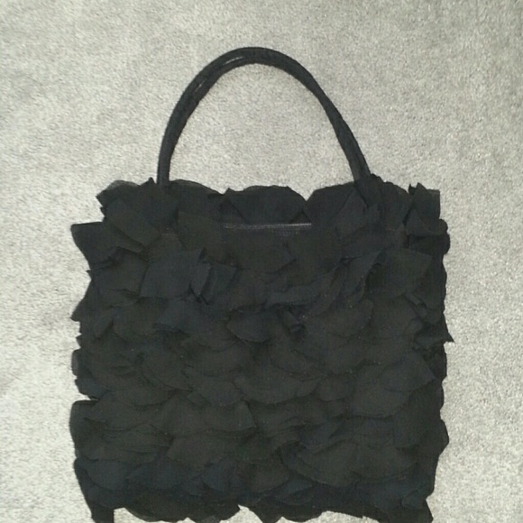Unique and so ladylike black purse