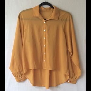 New long sleeve woven high low top