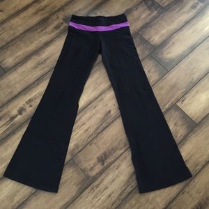 Lululemon size 4 yoga pants with purple band