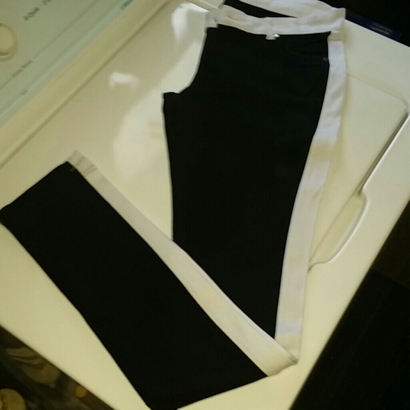 Sold!!!- pointe  black jeggings  with white stripe