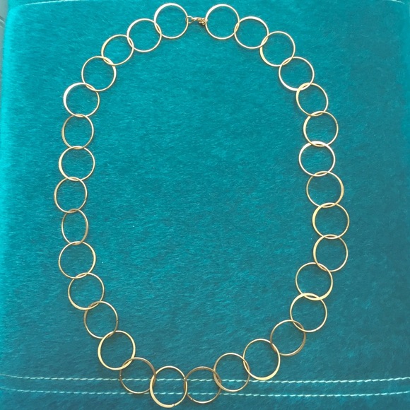 Circular Style!!  A choker, belt, or long strand!