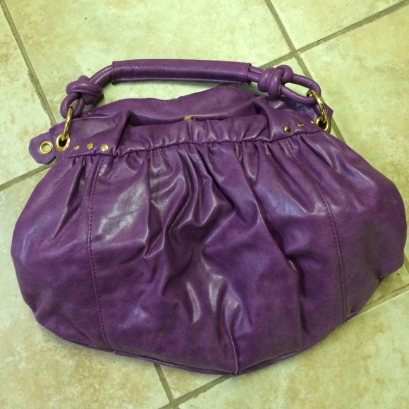 NEVER USED purple with gold Mark bag