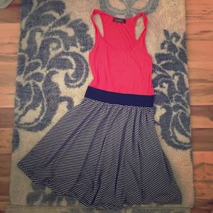 orange dress with black and white skirt