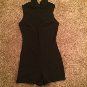 One piece high neck black romper.