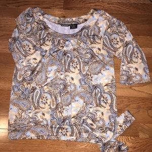 3/4 sleeve top with tie at waist.