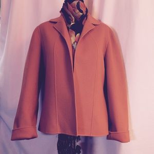Orange wool jacket.