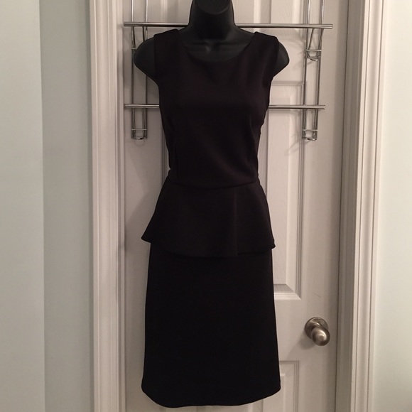 Black form fitting dress with skirted waist - Picture 2 of 2