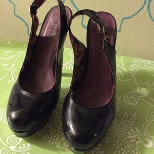 black patent leather sling-back pump