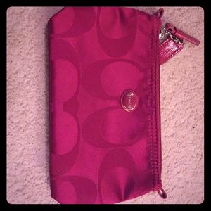 Coach fuchsia colored small bag