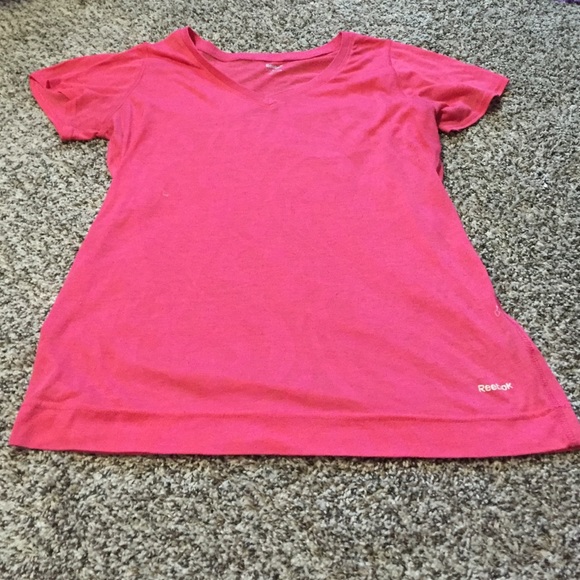 Nike shorts and reebok shirt