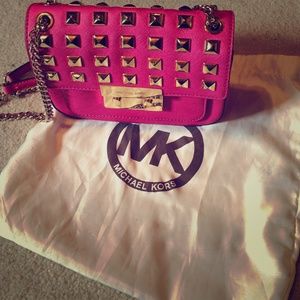 Authentic Michael Kors studded bag.