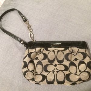 Coach wristlet. Signature C.